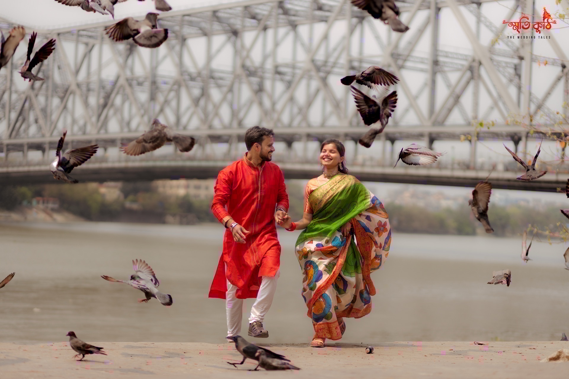 Sneha & Somnath running with pigeons by Howrah Bridge riverbank